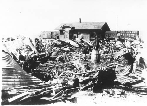 The rubble of brick and metal siding, all that is left after the fire