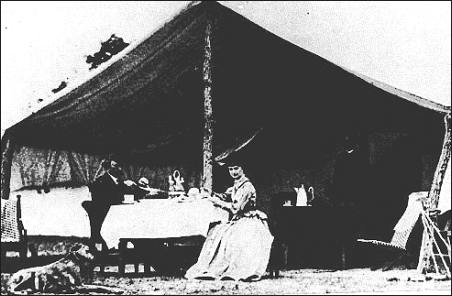 Custer and Elizabeth at ease in their tent home in Ellis county, Kansas -- probably in 1869, after his reinstatement as field commander of the Seventh U.S. cavalry.